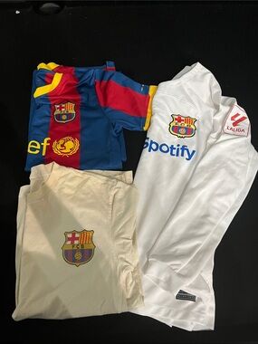 3 Adult FC Barcelona shirts.